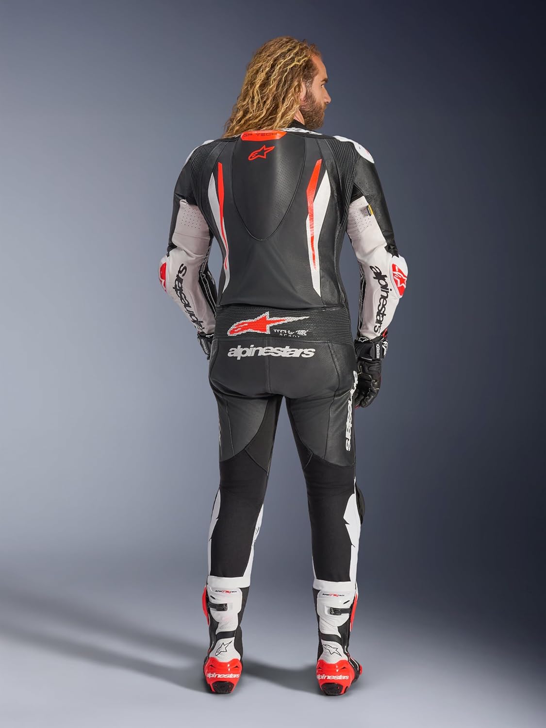 Alpinestars GP Tech V5 suit worth buying,should I buy Alpinestars GP Tech V5,Alpinestars GP Tech V5 pros cons,best MotoGP inspired racing suit,Alpinestars GP Tech V5 vs alternatives,Alpinestars GP Tech V5 worth it unboxing and complete package contents