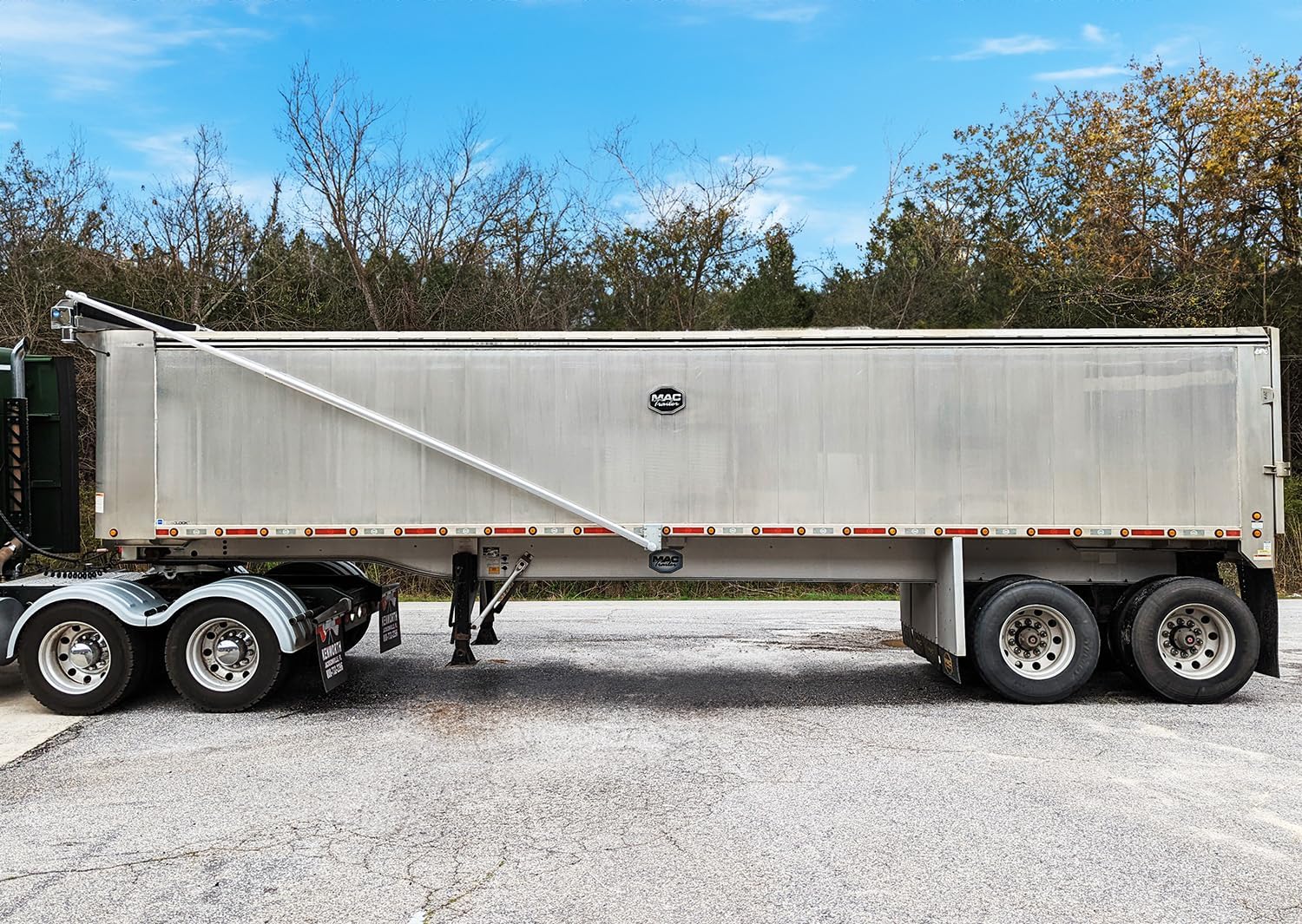 Carolina Tarps dump trailer tarp system,dump trailer tarp system pros cons,best electric tarp system for dump trailer,Carolina Tarps tarp system worth it,electric underbody tarp vs manual,how to install dump trailer tarp system - detailed features and technical specifications