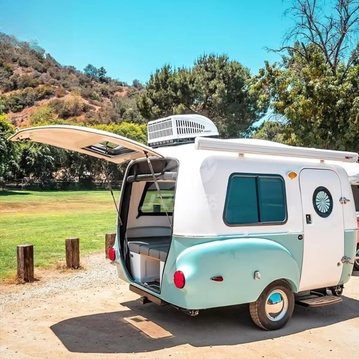 Detailed view of the best off road camper trailer showing galvanized frame, roof racks, and rear kitchen - analyzing off road camper pros cons and custom off road camper trailer options