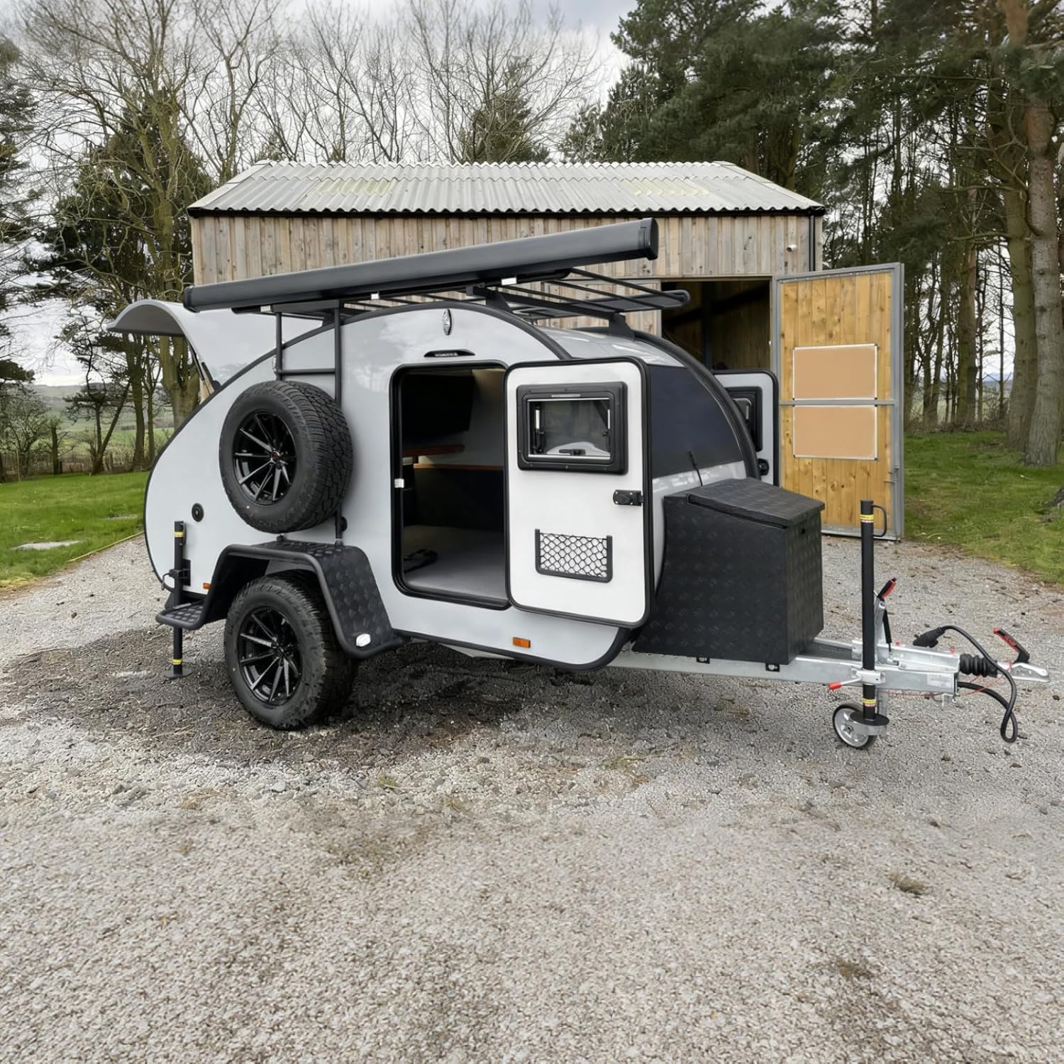 buy lightweight teardrop camper trailer,lightweight teardrop camper worth buying,best small tow behind travel trailer,teardrop camper trailer pros cons,compact camping trailer for SUV,should I buy a teardrop camper unboxing and complete package contents