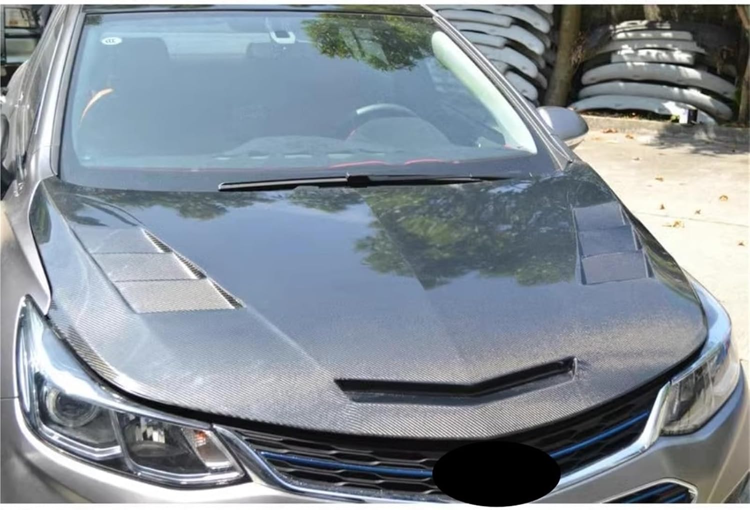 chevrolet cruze carbon fiber hood,carbon fiber hood chevy cruze pros cons,best chevrolet cruze engine hood cover,should i buy carbon fiber engine hood,chevy cruze hood replacement options,buy chevrolet cruze performance hood performance testing and real-world results