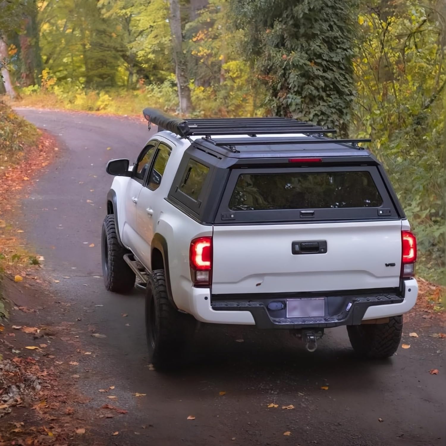 hard top pickup truck topper,should I buy a truck topper,hard top truck topper vs soft,manganese steel truck cap pros cons,best truck bed cap for Chevy Colorado,locking truck canopy worth buying performance testing and real-world results